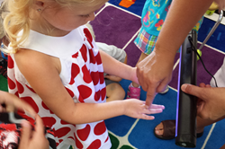 Logan County Health Department Brings Glo Germ Program to Preschool